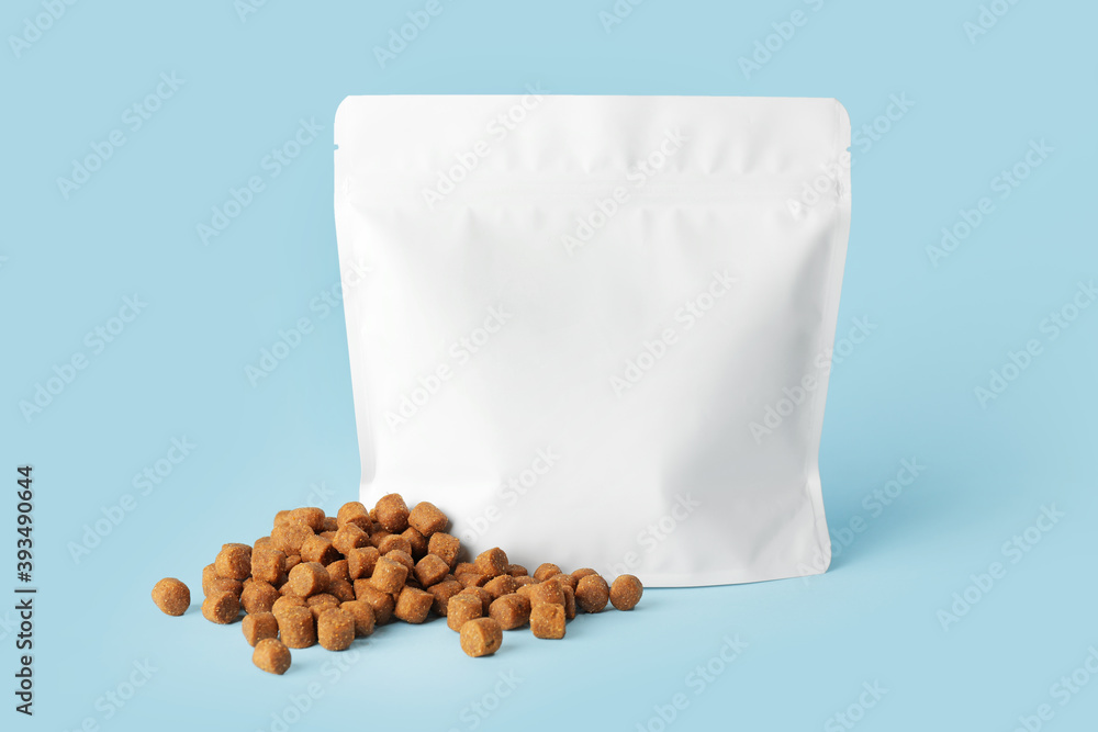 Tasty pet food on color background