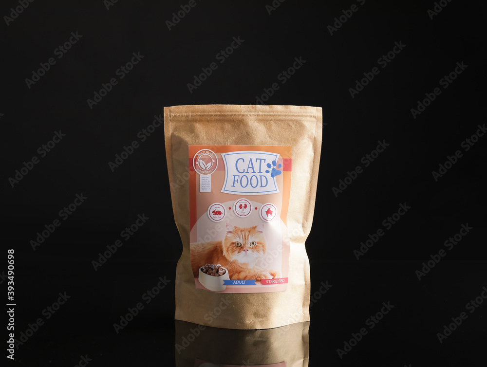 Tasty pet food on dark background