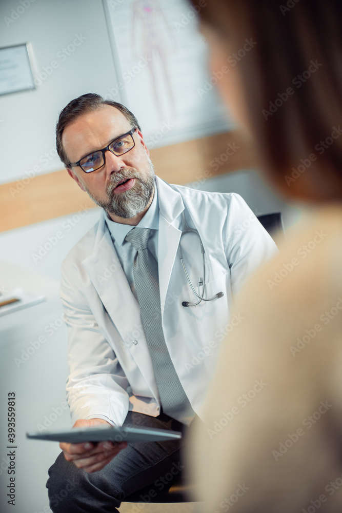 Doctors Consultation Office: Professional Physician Talks to Female Patient, Uses Digital Tablet Co