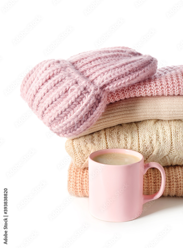 Stylish winter clothes on white background