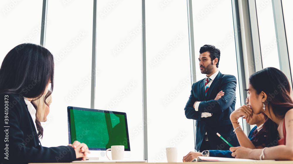 Business people in the conference room with green screen chroma key TV or computer on the office tab