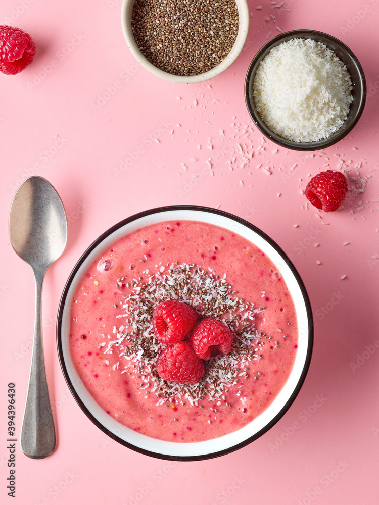 breakfast smoothie bowl on pink background