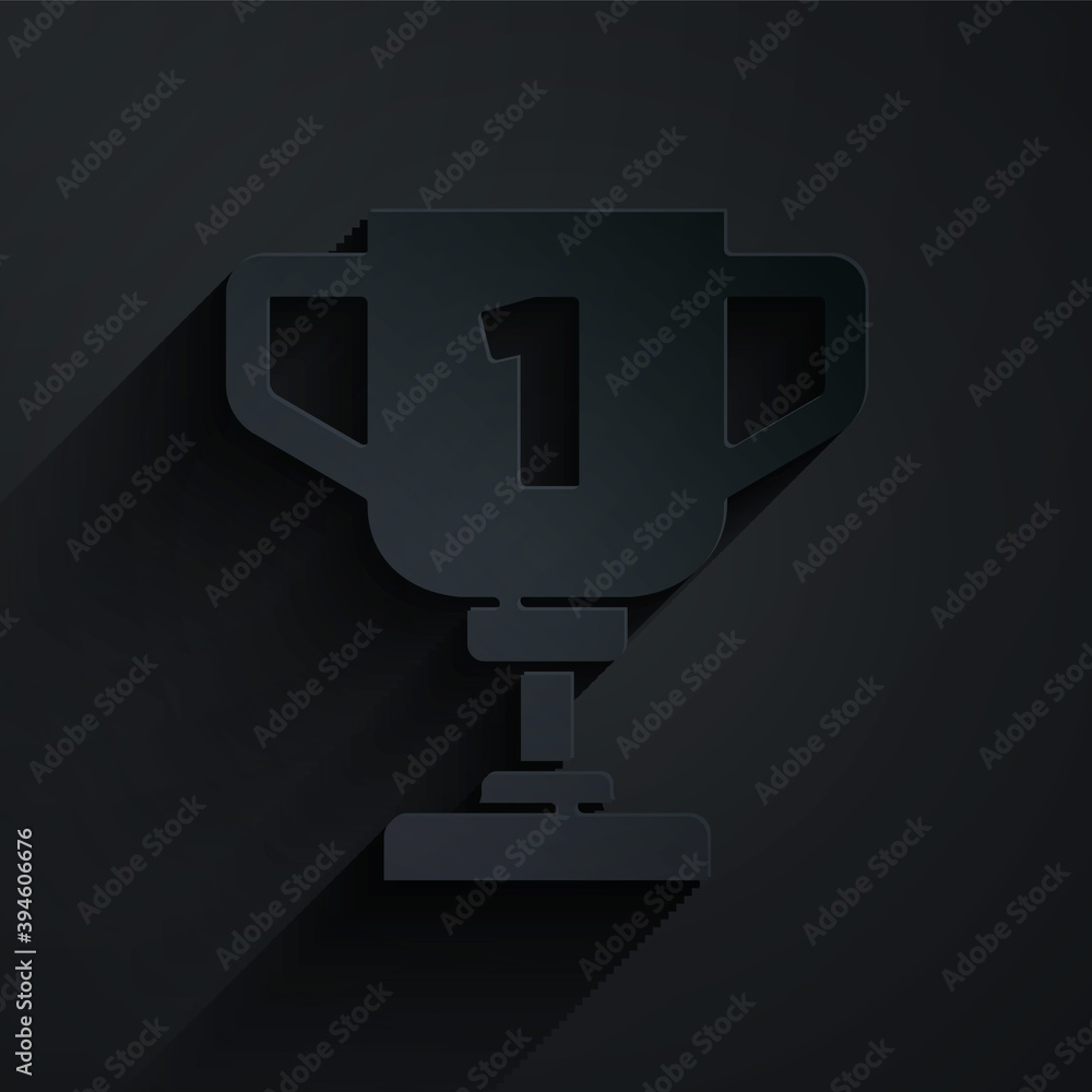 Paper cut Award cup icon isolated on black background. Winner trophy symbol. Championship or competi