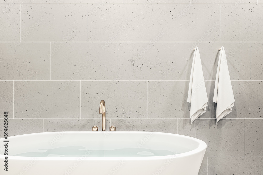 Comfortable bathroom room with bath and blank decorative wall.