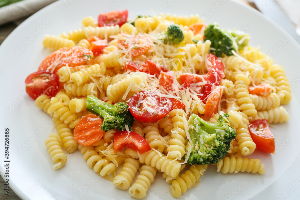 Plate with tasty pasta primavera, closeup