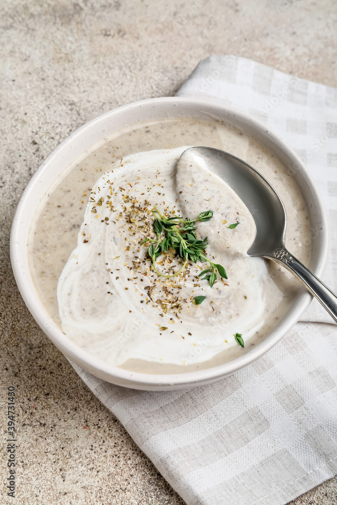 Tasty mushroom cream soup in  bowl, closeup