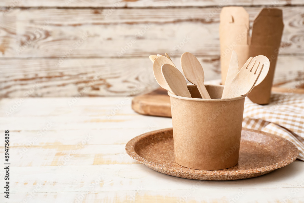 Eco tableware on table in kitchen