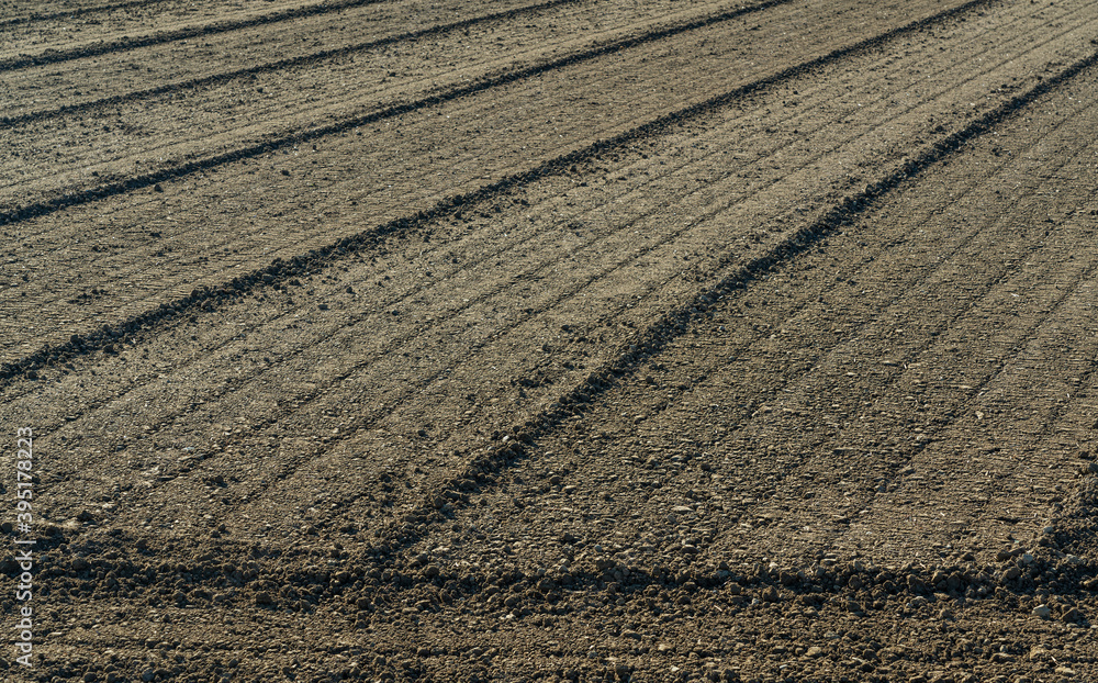 .Close-up of beautifully plowed fields