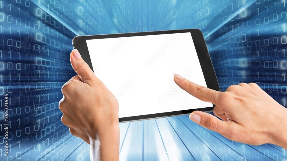 Human hands holding digital tablet with a white blank screen