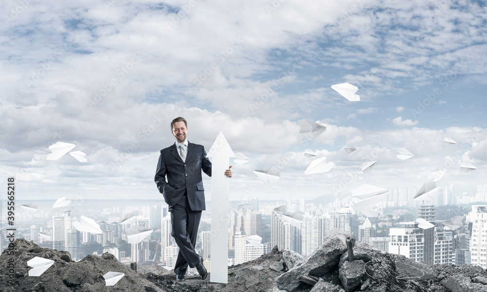 Conceptual image of businessman in ruins