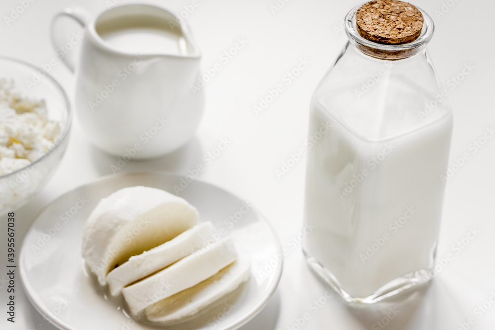 Fresh dairy products on white desk background