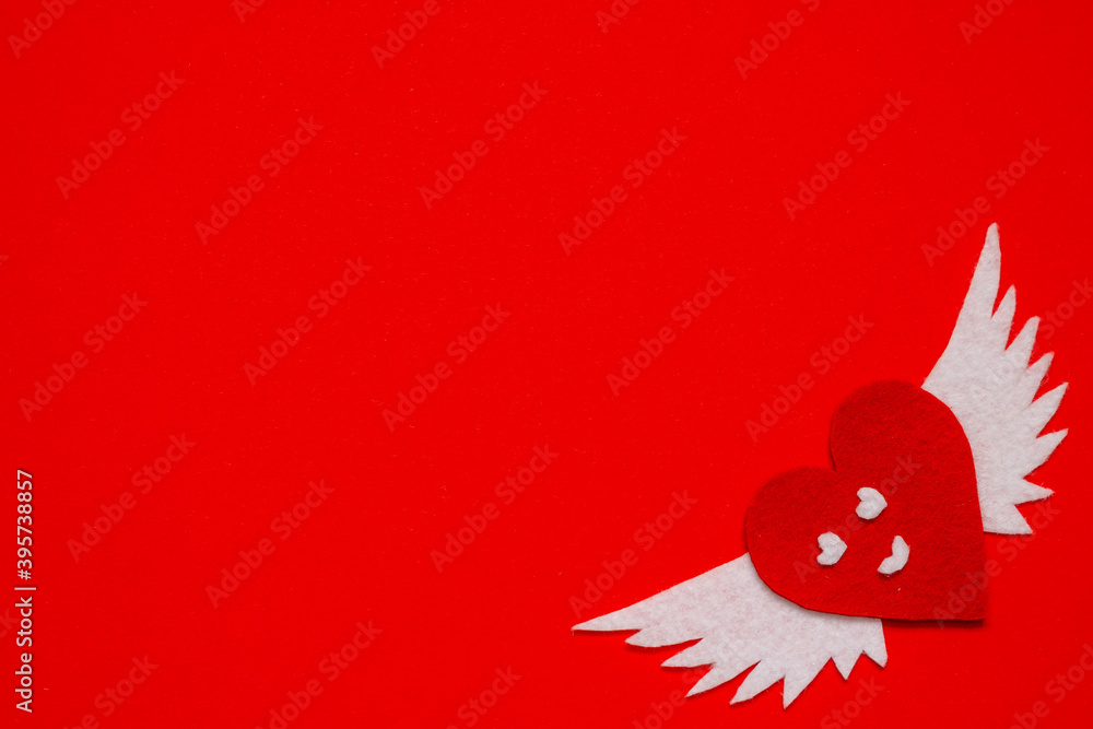 Valentines day. Red heart with white angel wings