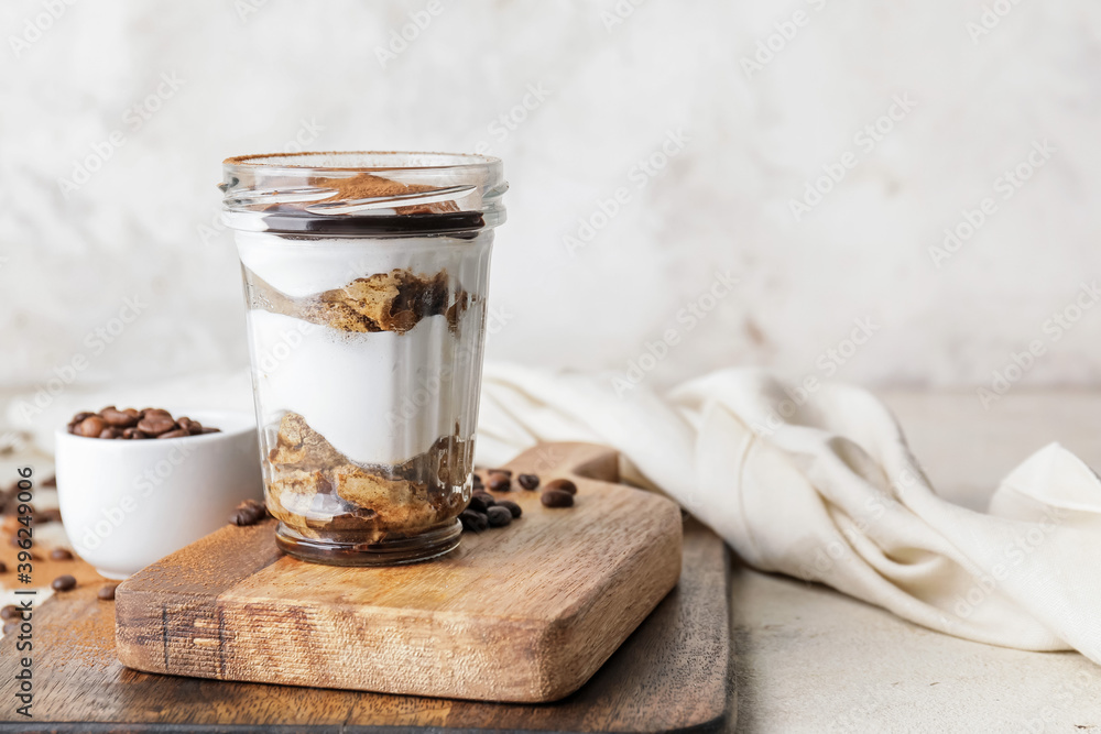 Sweet tasty tiramisu on table