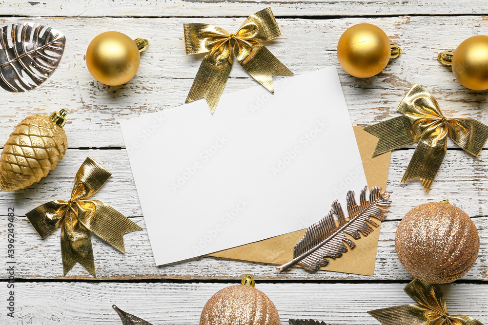 Beautiful Christmas composition with blank card on wooden background