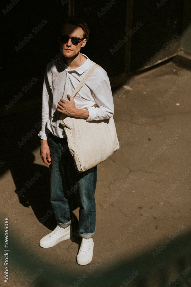 Casual man with eco tote bag