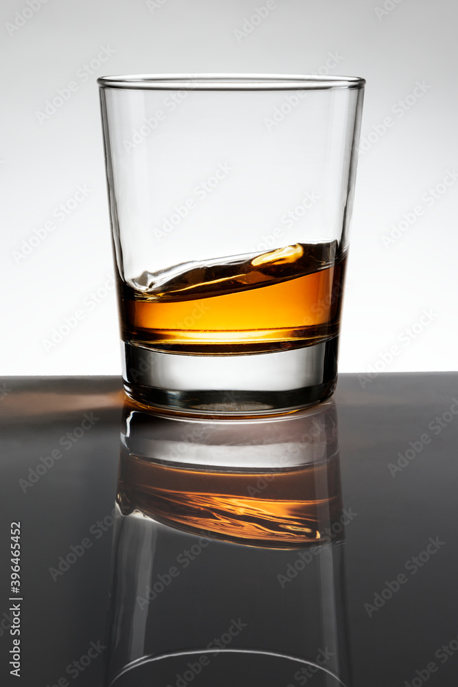 Swirling whisky in a glass