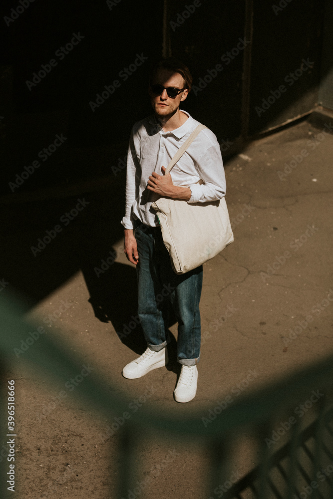 Casual man with eco tote bag