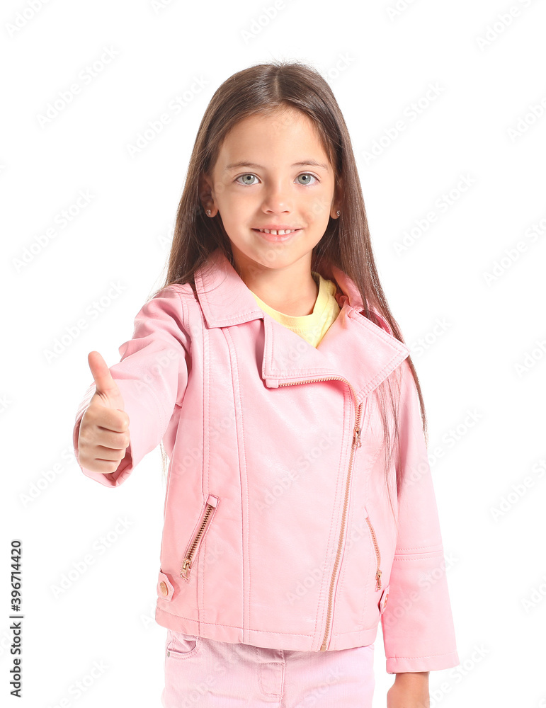 Cute little girl showing thumb-up gesture on white background