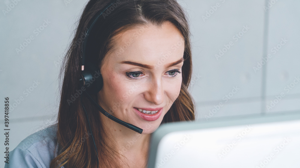 Business people wearing headset working in office to support remote customer or colleague. Call cent