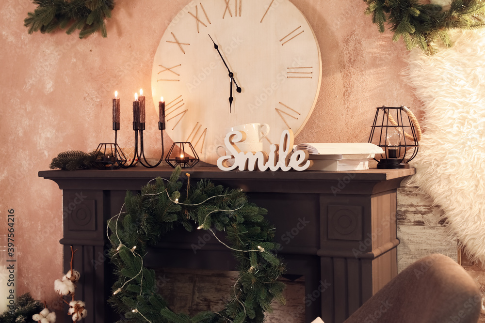 Fireplace decorated for Christmas in interior of living room