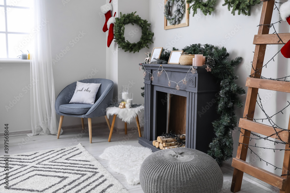 Decorated fireplace in interior of room on Christmas eve