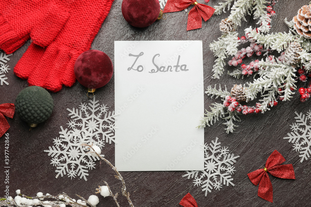 Blank letter to Santa and Christmas decor on dark background