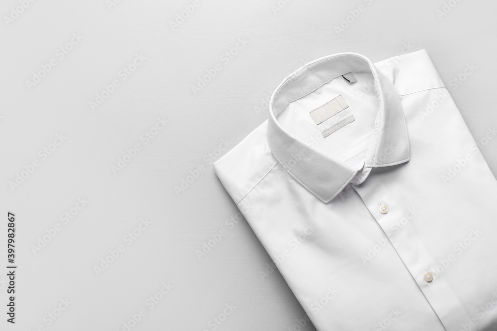 Stylish male shirt on light background