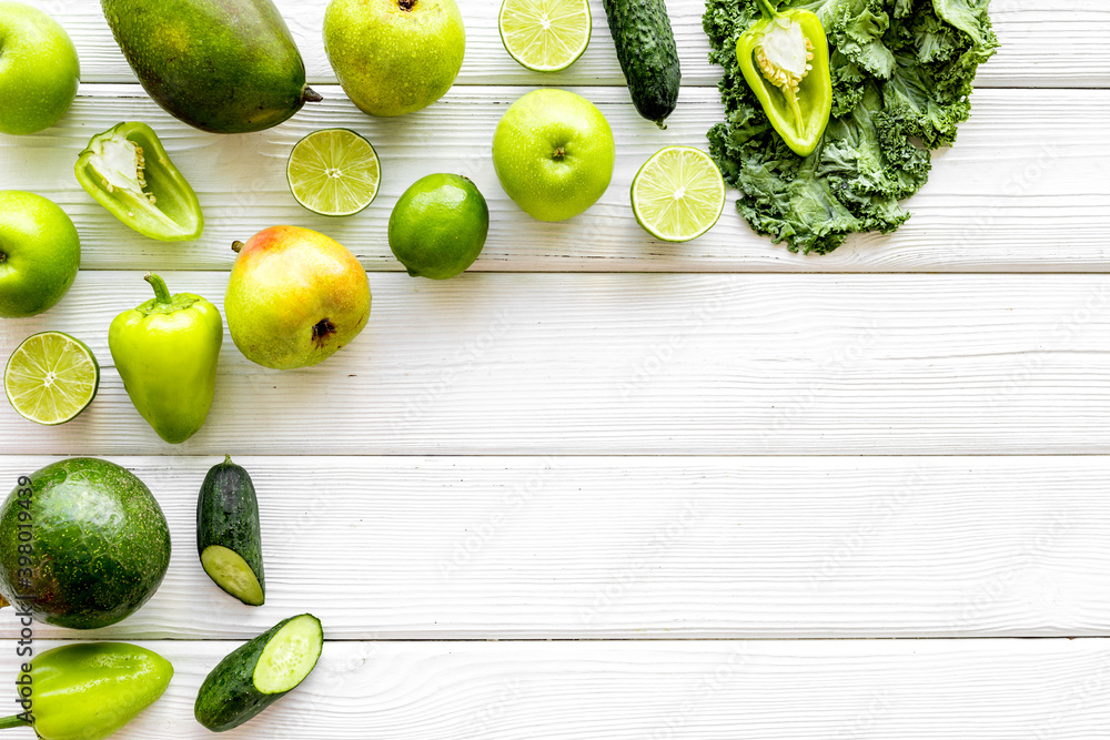 Flat lay of healthy vegetarian food - green vegetables top view