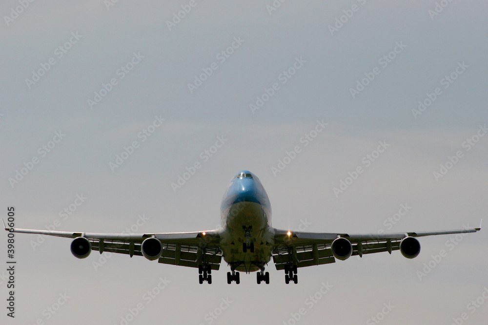 Passenger aircraft landing at close range.