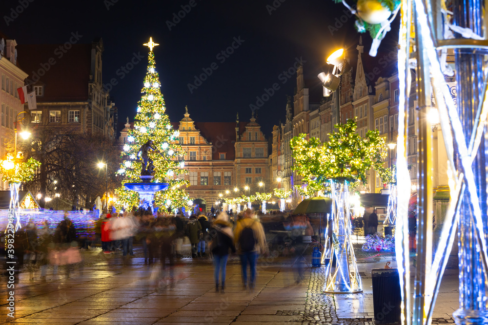 Neptune Fountain and a Christmas tree in the old town of Gdańsk. Poland