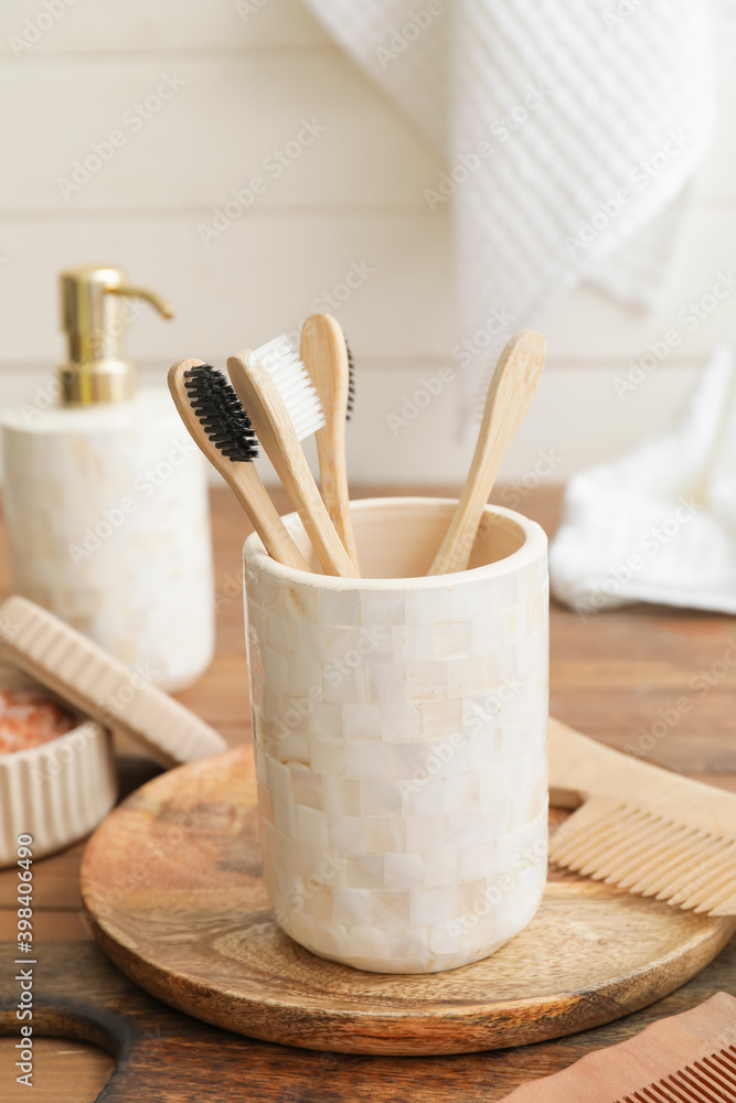 Set of bath accessories on wooden table