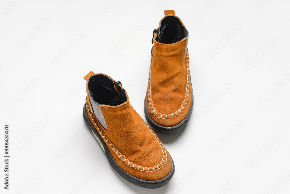 Childs shoes on white background