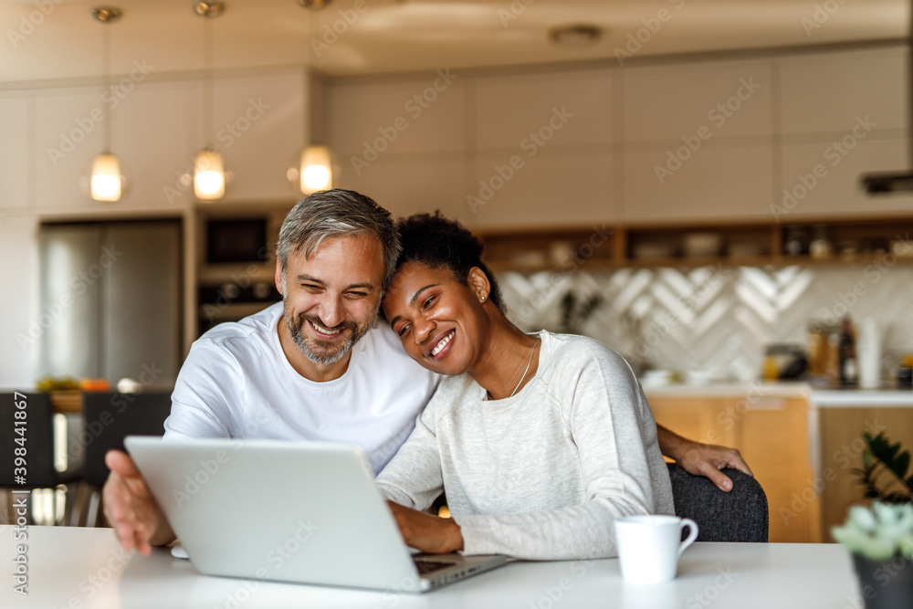 Enjoying together in their living room.