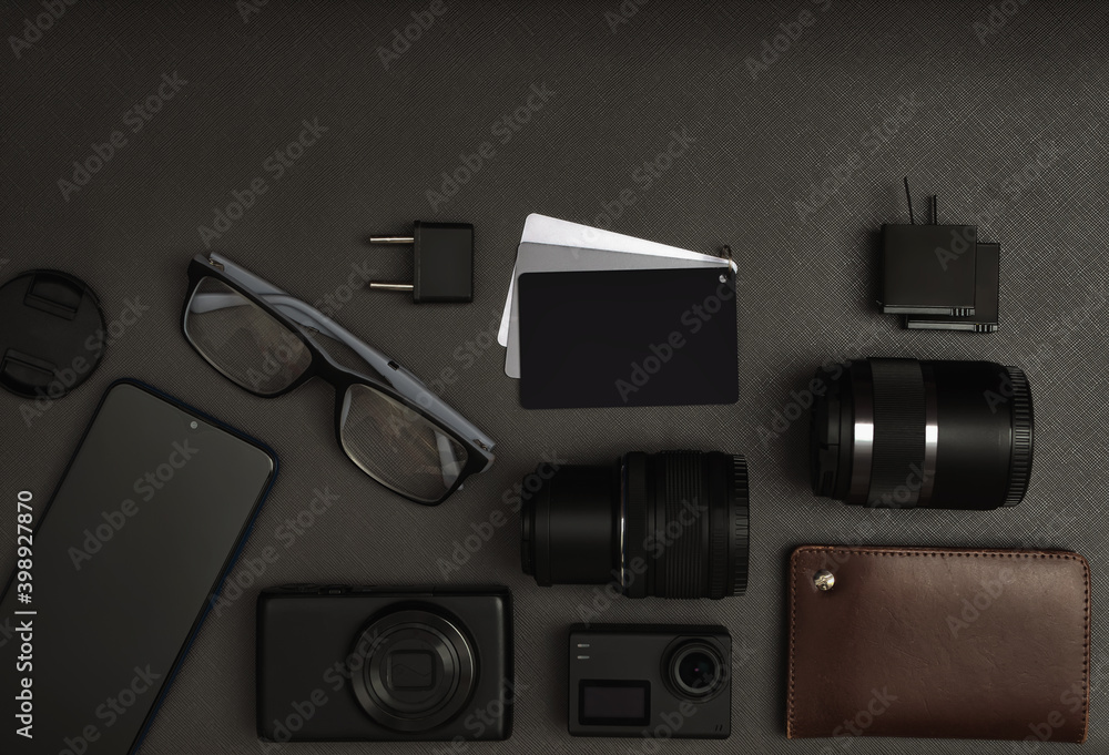 A set of the lens, cameras, batteries, smartphone, halftone target, glasses, plug dapter, cover of l