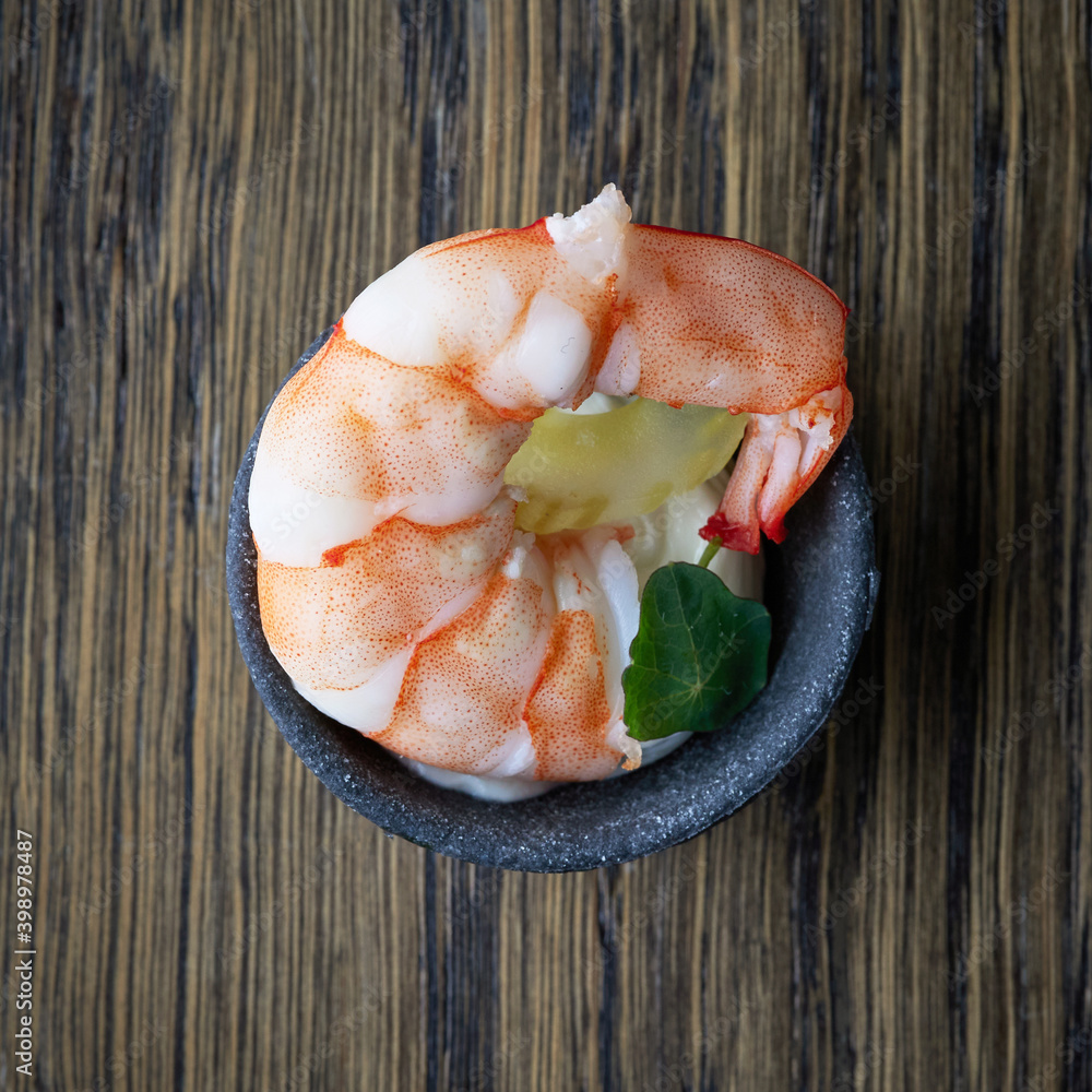 bowl of appetizer with boiled shrimp