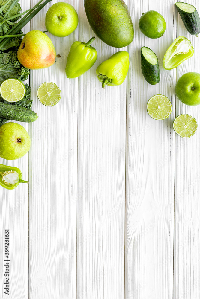 Flat lay of healthy vegetarian food - green vegetables top view