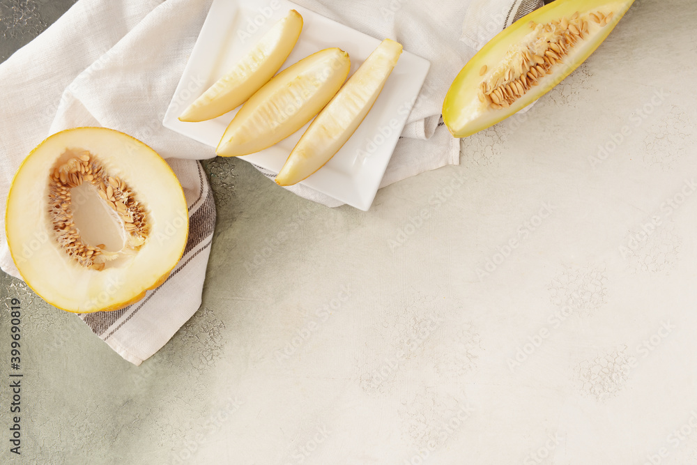 Composition with sweet cut melon on table