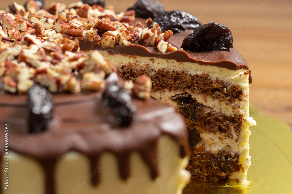 cake with chocolate, prunes and nuts