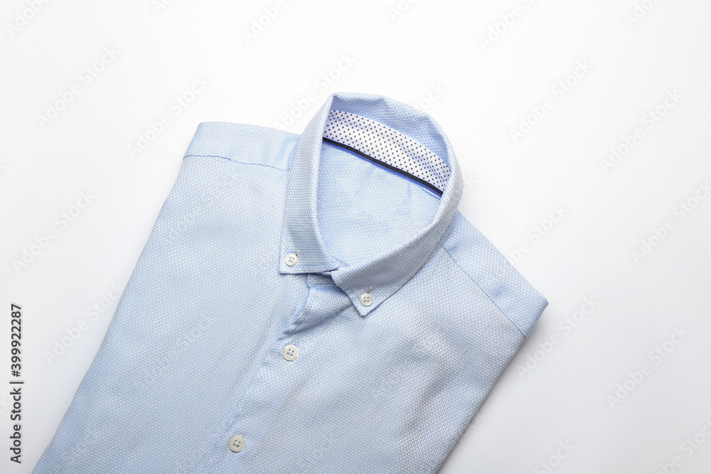 New male shirt on white background