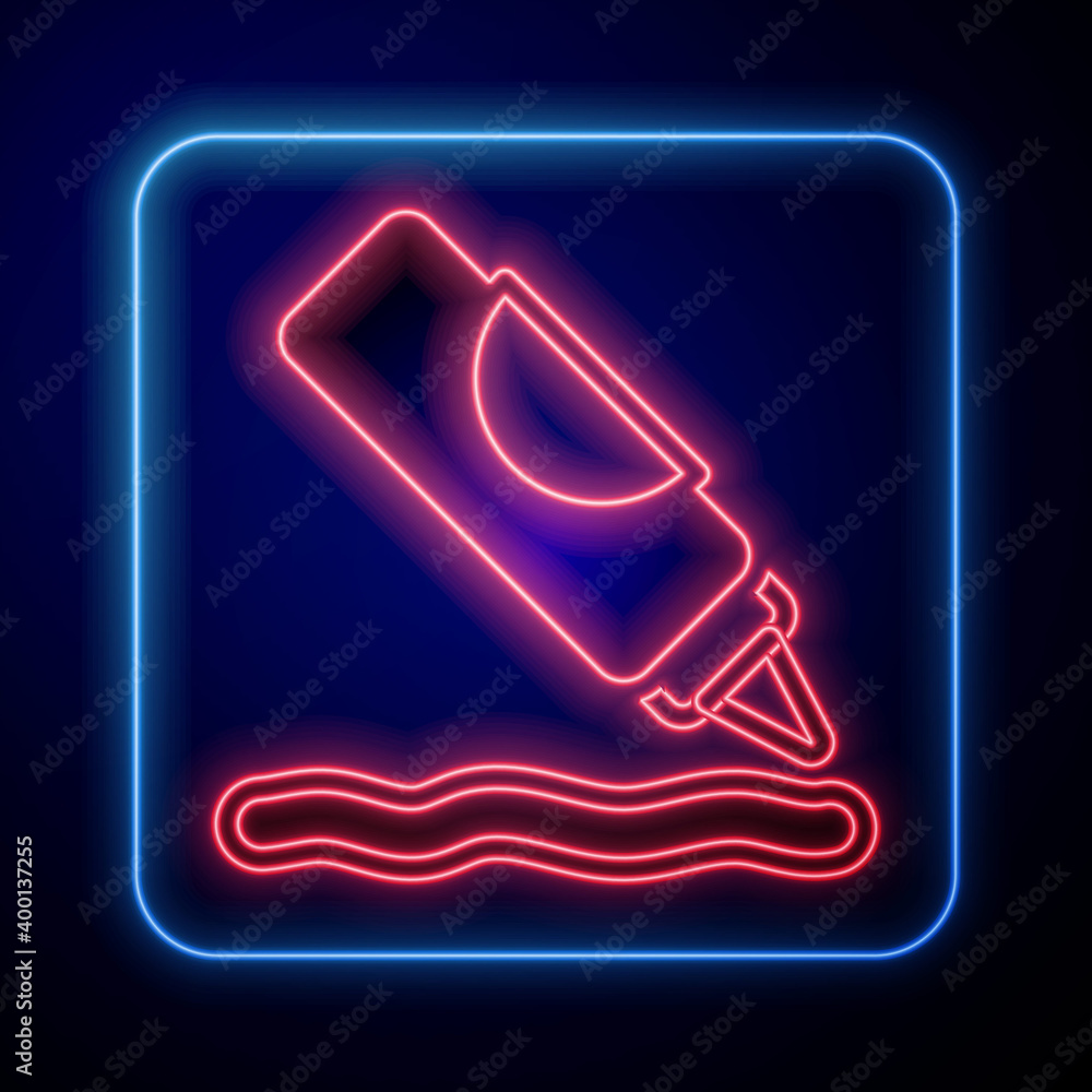 Glowing neon Ketchup bottle icon isolated on blue background. Barbecue and BBQ grill symbol. Vector.