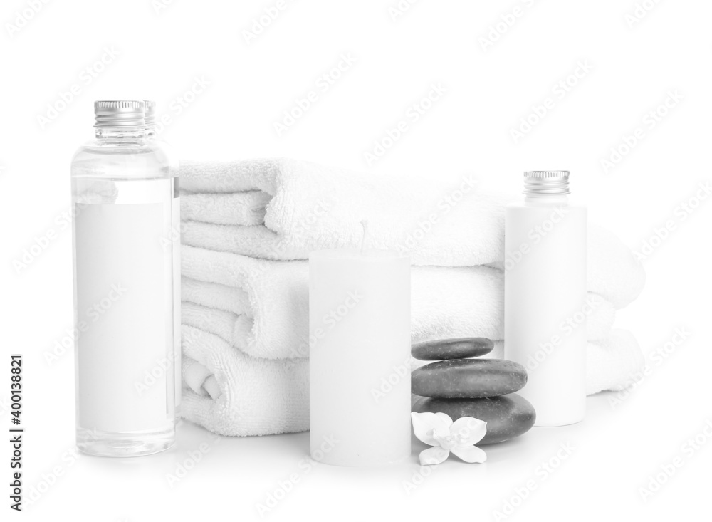 Spa composition with aroma candle on white background