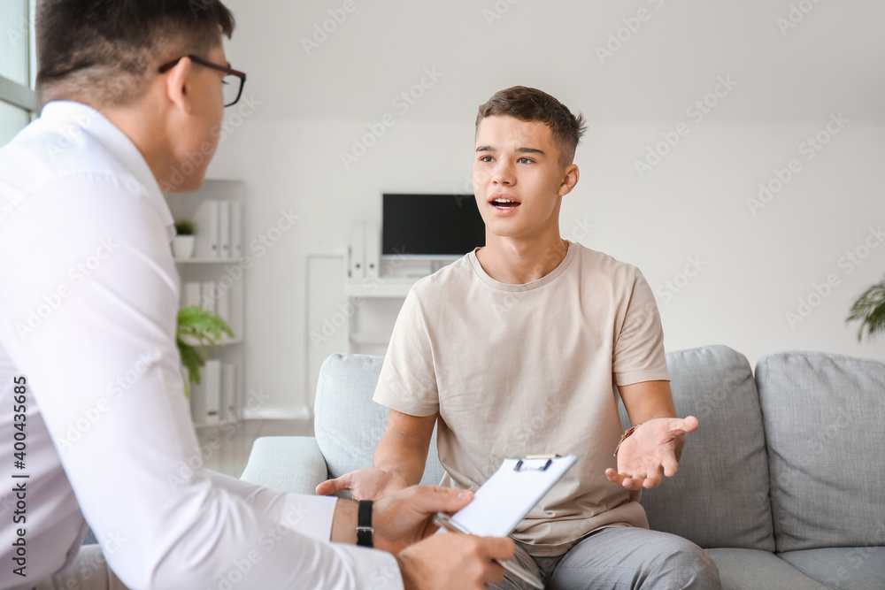 Teenage boy at psychologists office