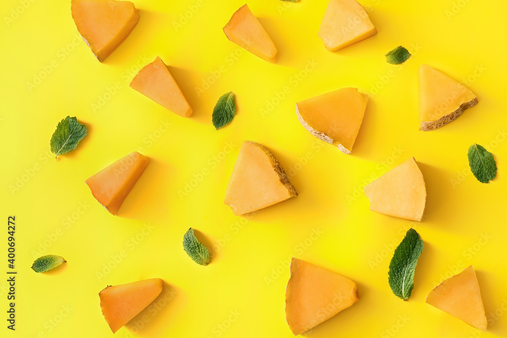 Slices of sweet melon on color background