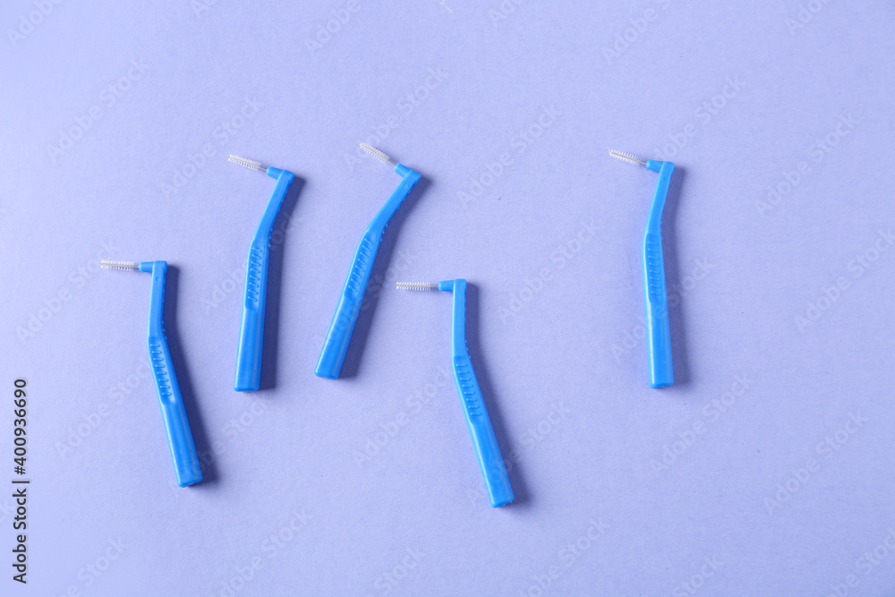 Toothbrushes for dental braces on color background