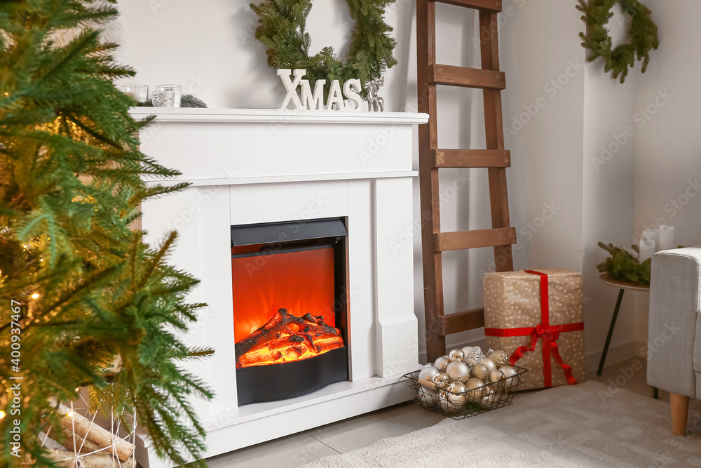 Fireplace in beautiful living room decorated for Christmas