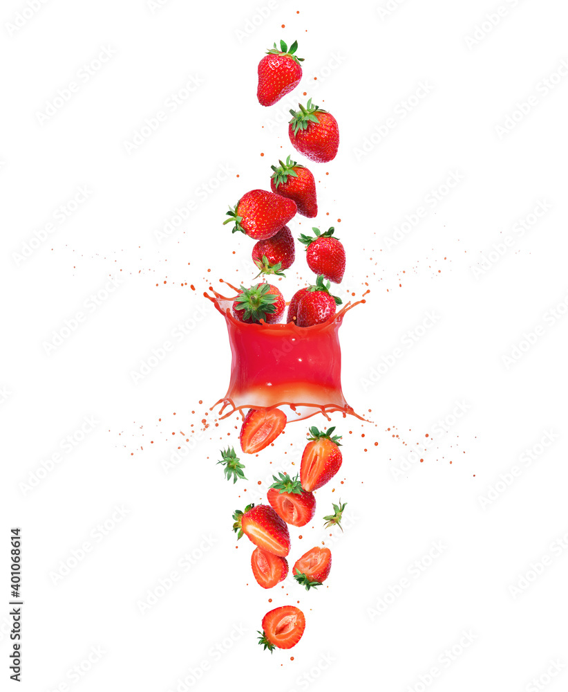 Whole and sliced fresh strawberries are falling down through splashes of juice