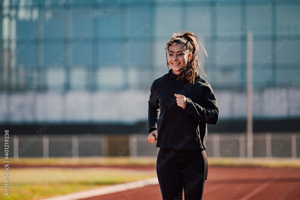 Smiling active girl, doing her training.