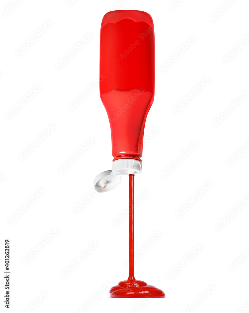 Ketchup flows from a plastic red bottle, isolated on white background