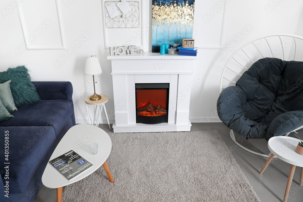 Fireplace in stylish interior of room