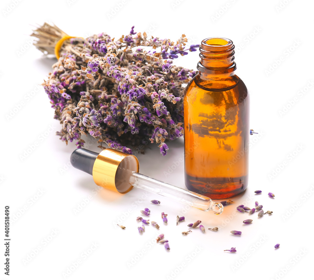 Bottle with lavender essential oil on white background